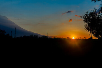 Scenic view of a sunrise over a field.