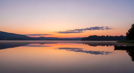 Fototapeta premium A serene and picturesque sunset over a calm lake with gentle ripples reflecting the colorful sky and distant silhouettes of trees and mountains