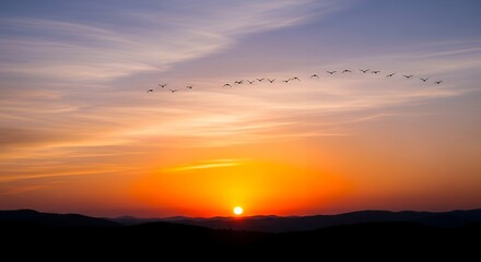 Fototapeta premium Beautiful Sunset Over Mountains With Flying Birds and Vibrant Sky