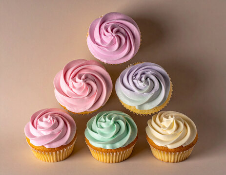 Pastel Swirl Frosted Cupcakes Arranged in a Pyramid