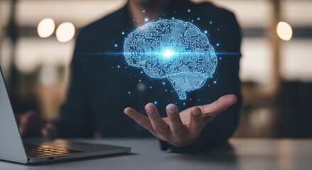Futuristic digital brain hologram levitates above person s hand with laptop nearby