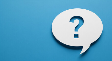 A white speech bubble with a question mark centered on a bright blue background, symbolizing inquiry and communication.
