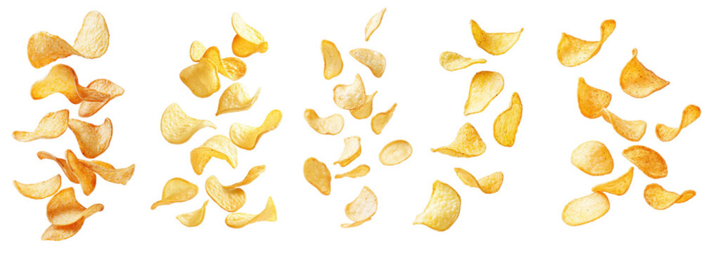 A collection of potato chips flying against a white background.