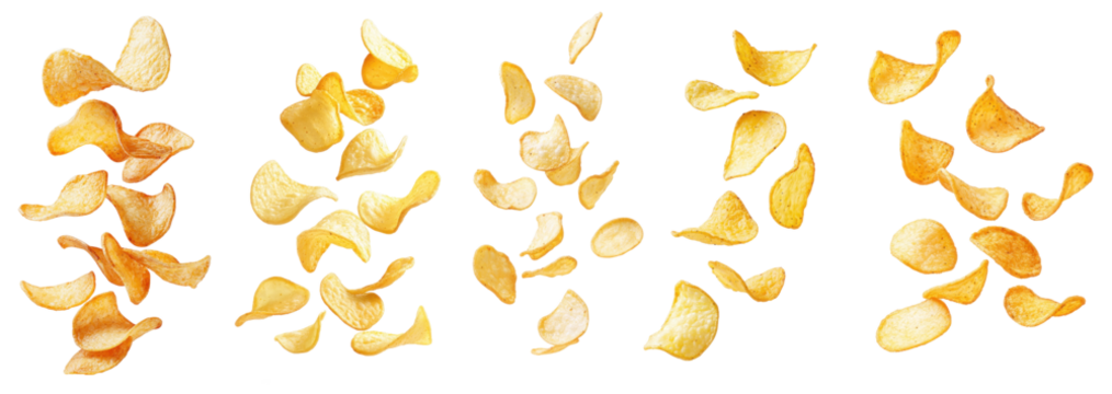 A collection of potato chips flying against a white background.