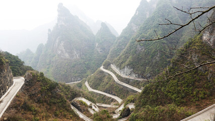 The road is known as the "Avenue to the Sky" and features a challenging 99 bends, famous winding mountain road at Tianmen mountain national forest park in Zhangjiajie, Hunan province China