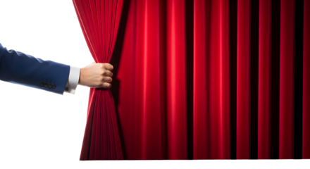 Hand pulling a red velvet theater curtain to reveal a bright white background on stage