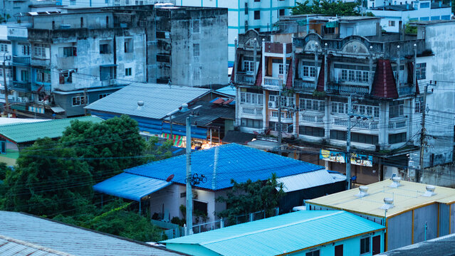 bangkok city canals river buildings traditional architecture busy smog capital