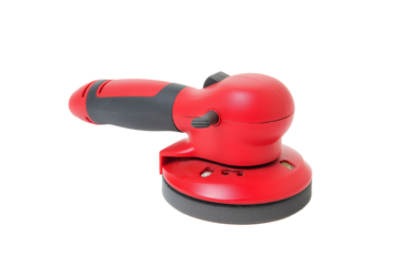 Close-up of a vibrant red electric sander with a black grip handle and sanding pad on transparent background
