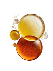 Glossy amber and gold colored bubbles on a solid black background