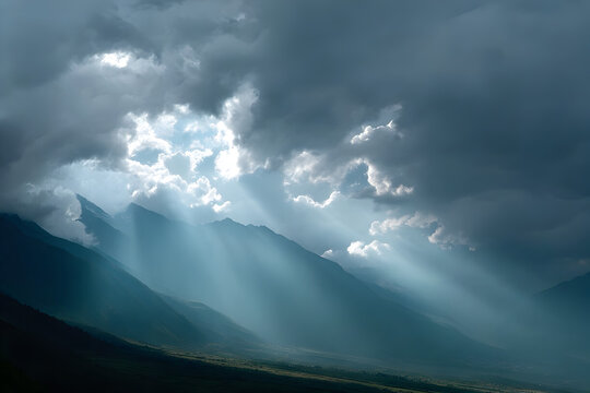Dramatic mountain landscape with sun rays shining through clouds nature scenic view photography stock image
