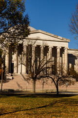 A sunny autumn day in Washington, DC. The White House stands amid autumn trees. The US government  shut down. Memorial Day in capital of USA.