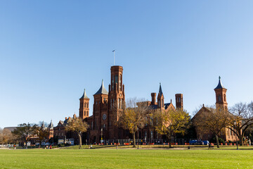 A sunny autumn day in Washington, DC. The White House stands amid autumn trees. The US government  shut down. Memorial Day in capital of USA.
