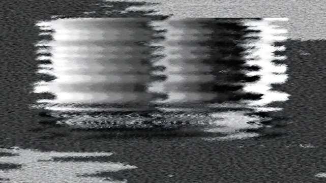 Glitch abstract: A black and white image displays a glitch with distorted, pixelated stripes, creating a sense of digital corruption.