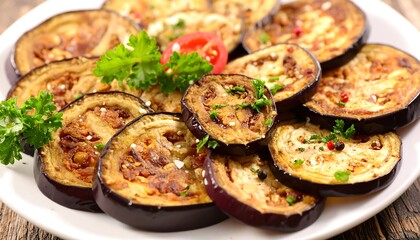 Sliced and cooked purple vegetables are artfully arranged with herbs and a red garnish on a white plate