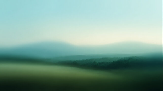 Soft focus misty landscape with rolling hills and serene sky abstract background