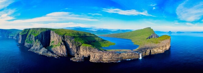 Sorvagsvatn lake on cliffs of Vagar island in sunset time, Faroe Islands, Denmark.