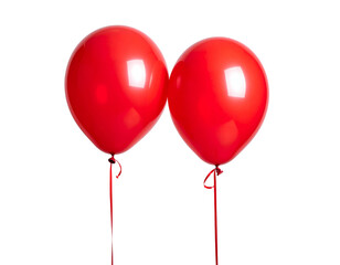 Two glossy red balloons with strings on black background