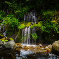 Doryu Falls on the Kawamata River in Yamanashi Prefecture, Japan: Water flows in thin, silky...