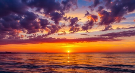 Obraz premium Vibrant Sunset Over Calm Ocean Waters.