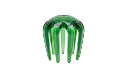 Green glass flower frog, a vintage floral arranging tool with multiple holes for holding flower stems upright