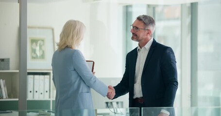 Business, people and interview with handshake in office for welcome, introduction and recruitment. Mature staff, meeting and shaking hands with agreement, thank you and congratulations for onboarding