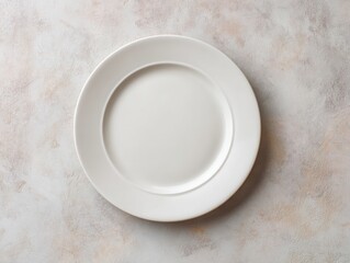 Simple white ceramic plate centered on a beige and cream textured surface