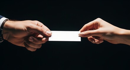 Passing Blank Card Between Two People on Dark Background