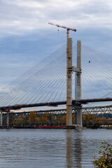 New Westminster Cable-Stayed Bridge Under Construction With Crane Over Fraser River, BC Canada Scene Urban