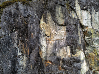 Rugged Rock Cliff Wall Texture With Moss and Cracks in BC Canada