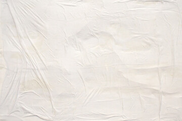 white crumpled and creased glued wrinkled paper poster texture background