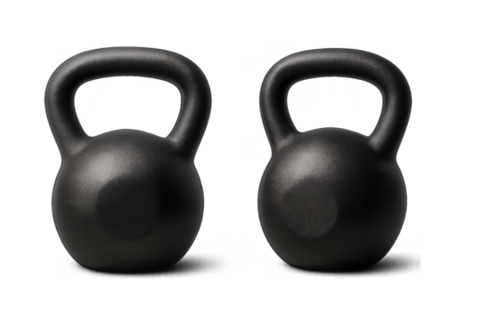 Two matte black kettlebells on a white background for strength training and fitness
