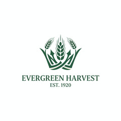 Fototapeta premium A logo features wheat stalks within a crown-like design above text, all in green and white on a white background