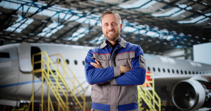 Proud Aircraft Engineer Performing Scheduled Maintenance