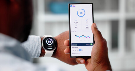 Smartwatch Application: African-American Man Uses Device
