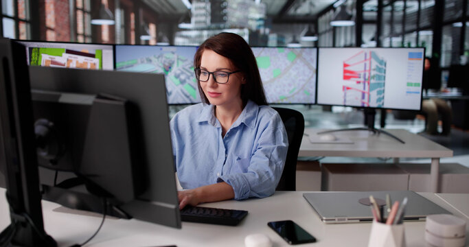 Young Engineer Using GIS Software For Construction Inspection