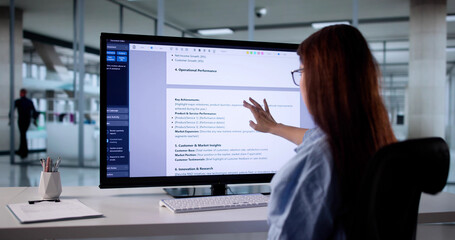 Woman Analyzing Business Revenue Financial Report Document Online