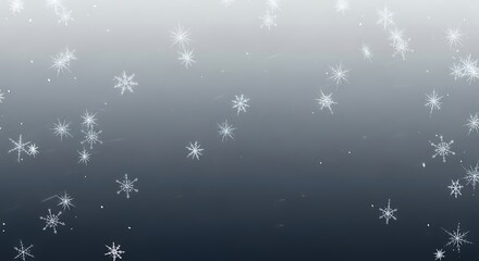 A serene winter scene with delicate, sparkling snowflakes drifting down against a soft gray and dark blue gradient sky for holiday backgrounds