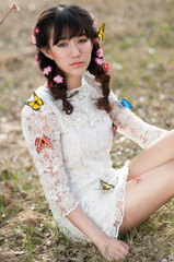 Eastern women photographed outdoors in spring	