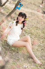 Eastern women photographed outdoors in spring	
