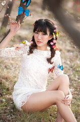 Eastern women photographed outdoors in spring