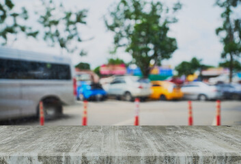 View from inside the coffee shop. Concrete Counter. Glass backdrop with raindrops stuck on the glass.