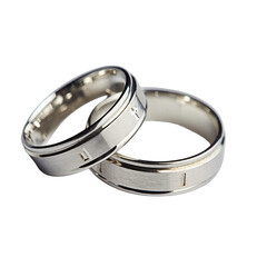 Two Silver Wedding Rings With Engraved Details On Black Background Macro Studio Shot