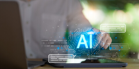 A person interacts with a digital AI interface on a tablet, featuring speech bubble graphics and circuit patterns, symbolizing intelligent chatbot, virtual assistant, automated communication systems.