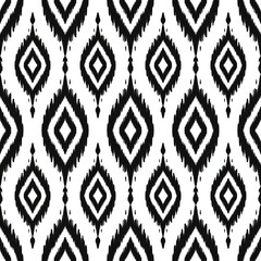 Black and white symmetrical pattern featuring repeating elongated diamond shapes with internal geometric designs