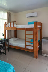 wooden bunk bed in hotel 