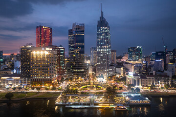 Naklejka premium August 12, 2024: sunset in District 1, Ho Chi Minh City, Vietnam
