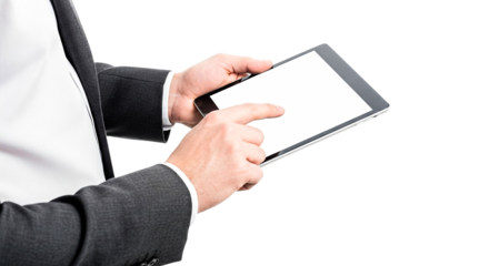 A person in formal attire interacts with a tablet, showcasing professional use of technology in business settings.