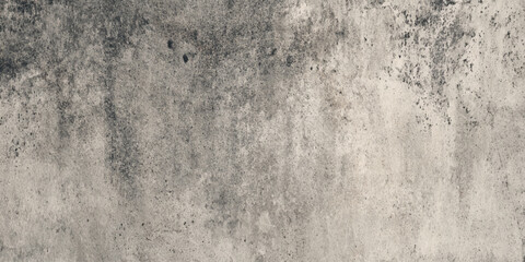 Abstract distressed vintage plaster wall background for overlay featuring authentic scratches and subtle stains on a black to gray gradient background.	
