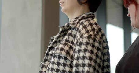 Expert crafts tailored fashion pieces, Fashion specialist meticulously modifies outfits for occasions, Creative fashion professional carefully customizes clothing to suit unique event needs