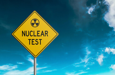 Fototapeta premium Nuclear Test Ahead Road Warning Sign